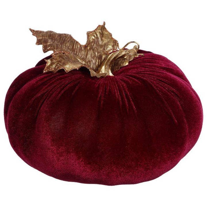 Burgundy velvet pumpkin with a gold leaf and stem.