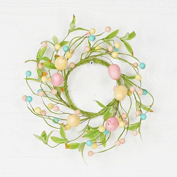 Pastel egg wreath with willow leaves.
