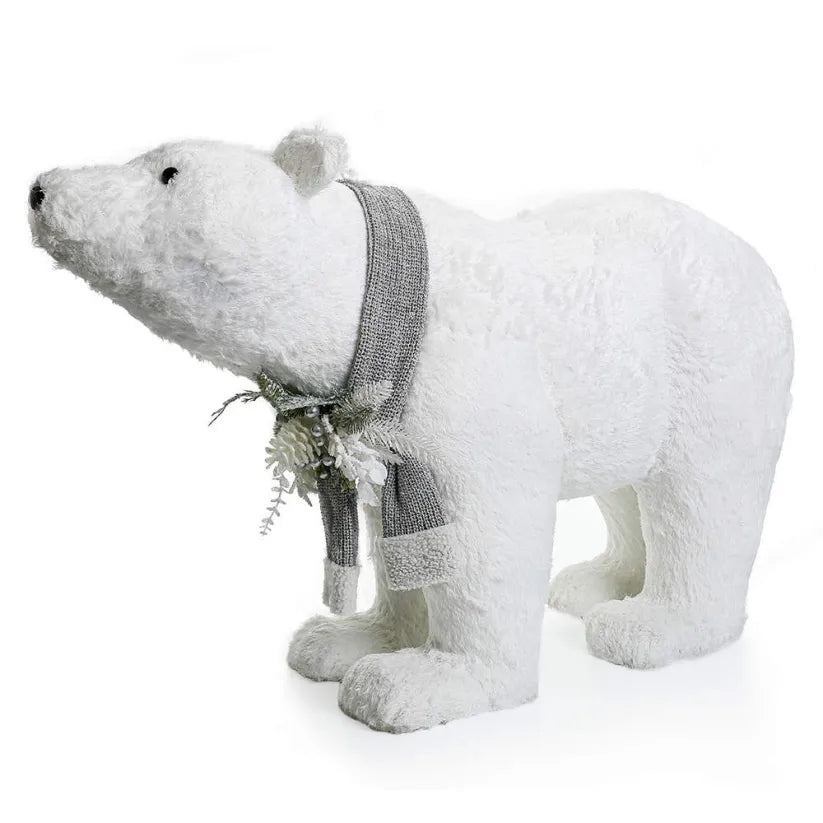 White polar bear figurine on all fours with a silver scarf.
