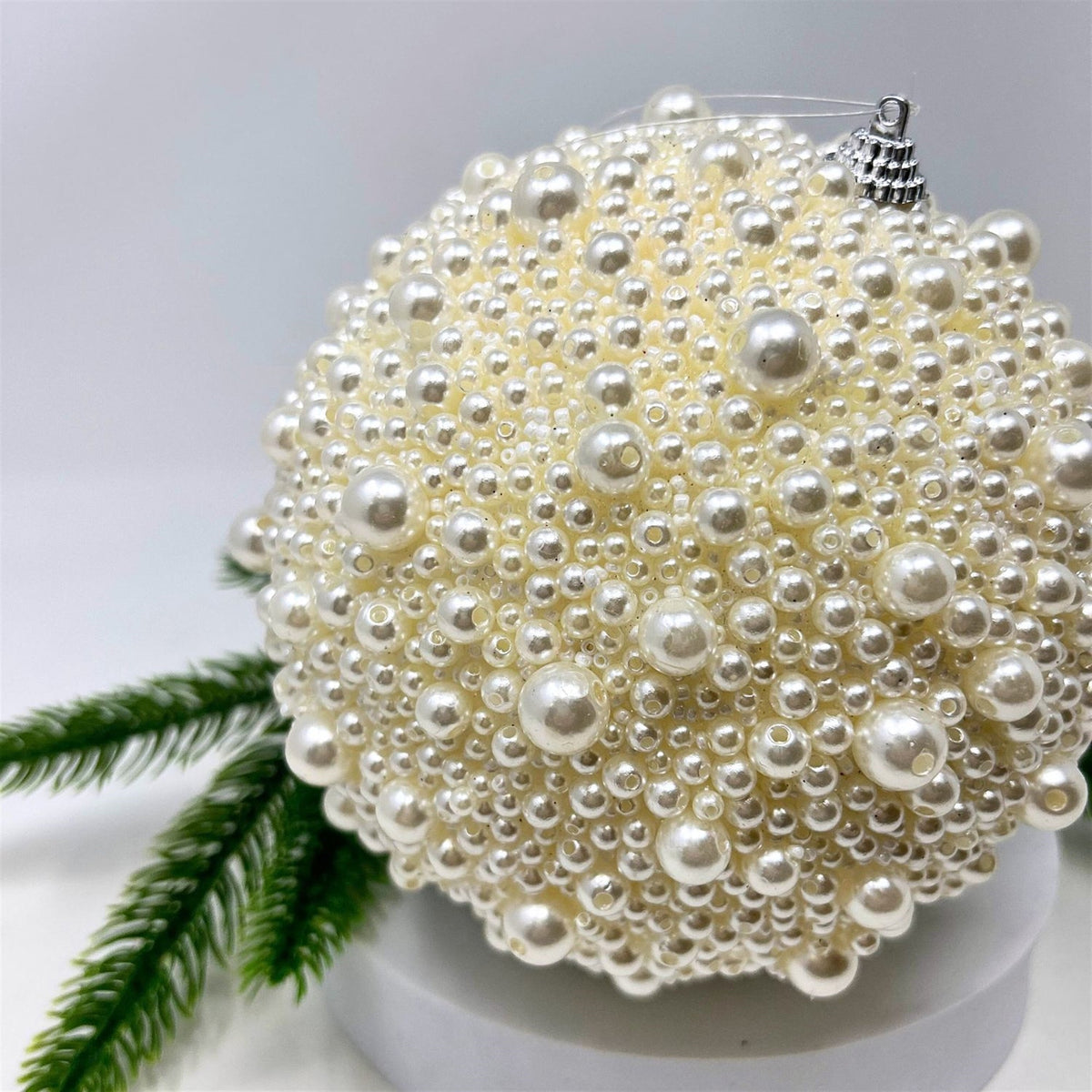 Pearl white ball ornament.