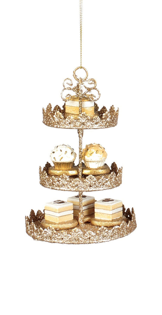 Gold glitter cake stand ornament with a classic sweets display.