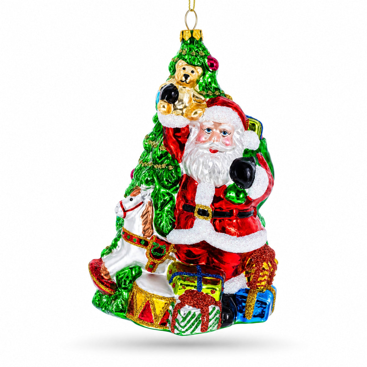 Green glass Christmas tree ornament with Santa waving, a teddy bear and gifts at the base.