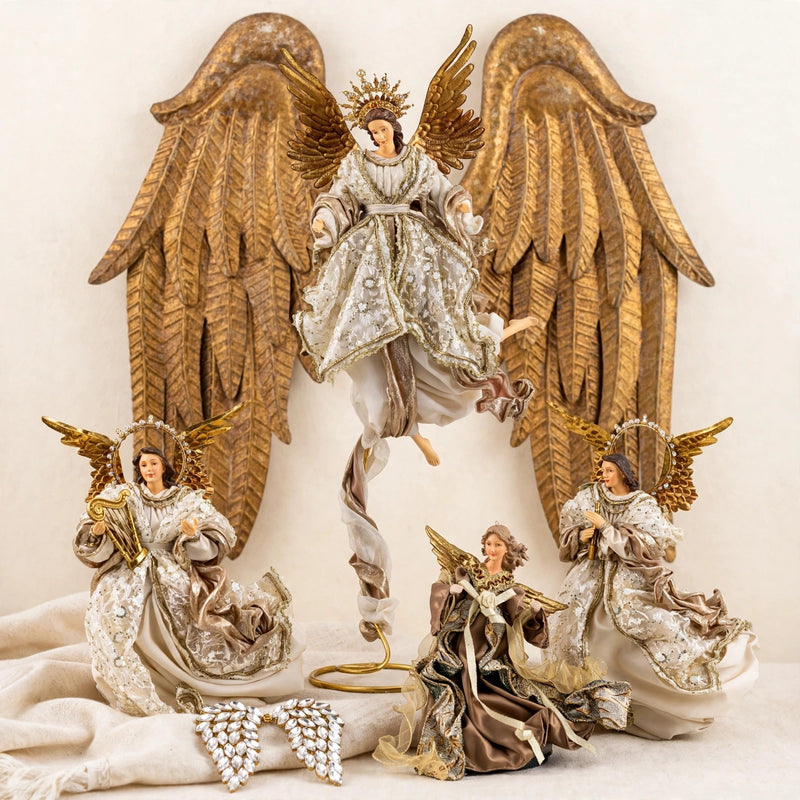 Crowned ivory angel on a gold spiral stand at center, flanked by a pair of ivory-champagne harp and prayer angels, a small bronze-gold angel and crystal gem wings in front, antique-gold carved wings behind, on warm cream.