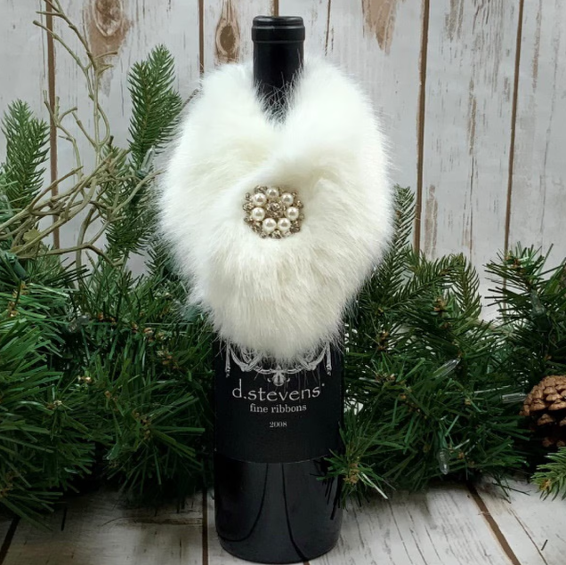 Centerpiece with bottle wrap faux mink detail.
