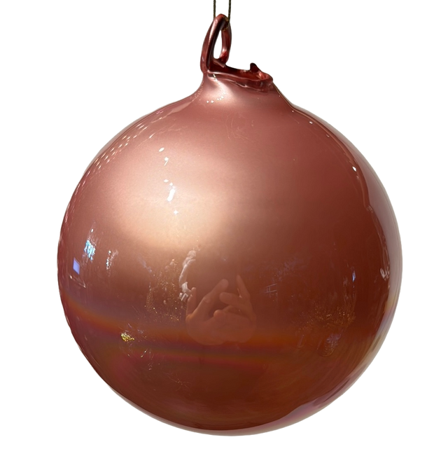 Light pink pearlescent glass ornament.
