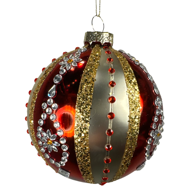 Jeweled glass ornament in red, white and gold.