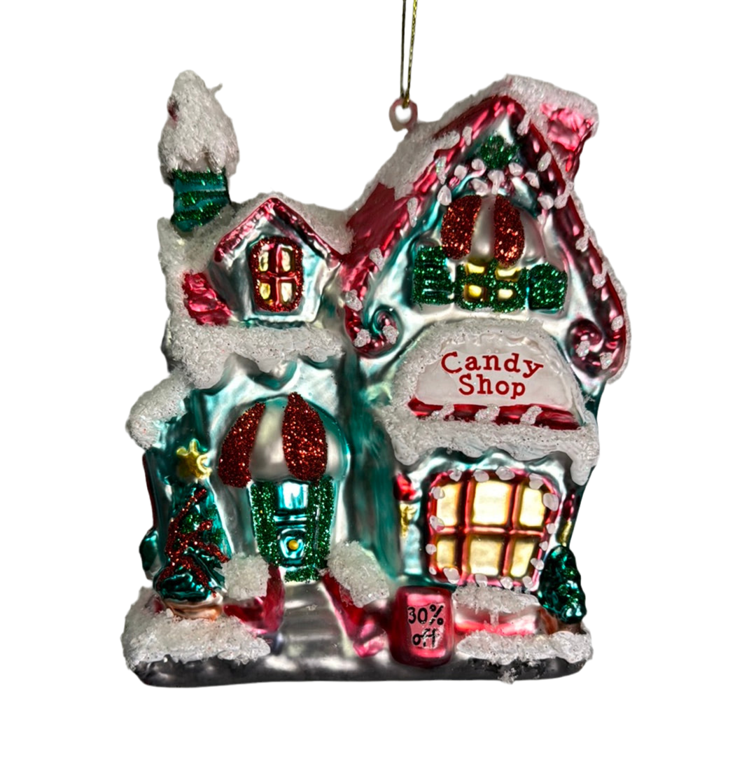 Glass candy shop ornament in teal, pink and red with snow detail.
