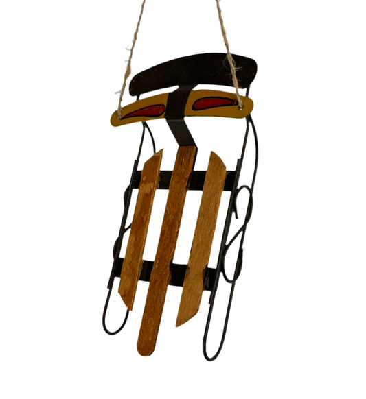 Ornament with sled detail.
