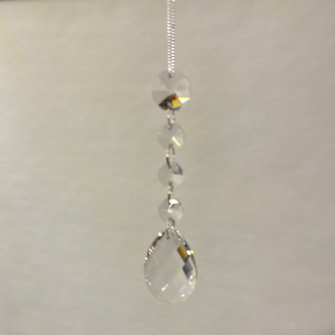 Ornament with crystal drop 5" detail.