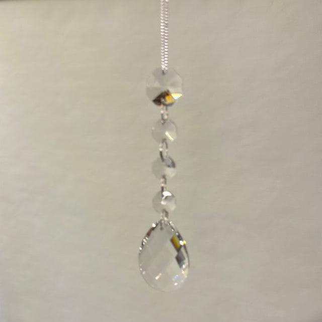 Ornament with crystal drop 5" detail.