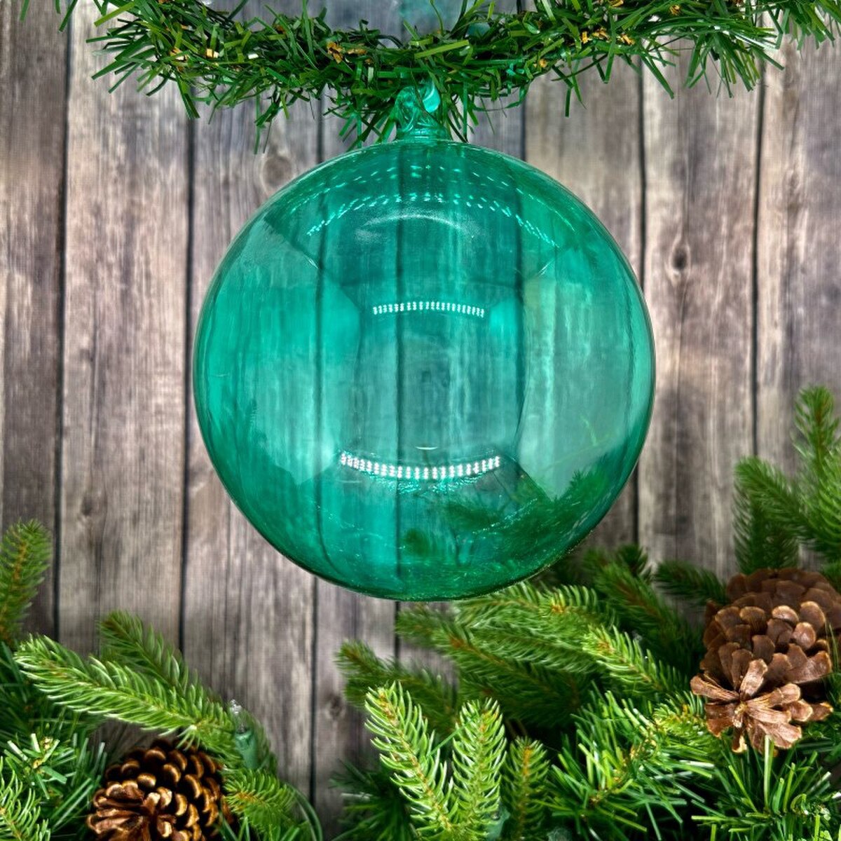 Turquoise glass ball ornament for holiday decorating