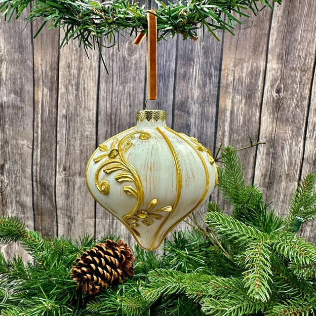 White and gold ornament with a classic finish.