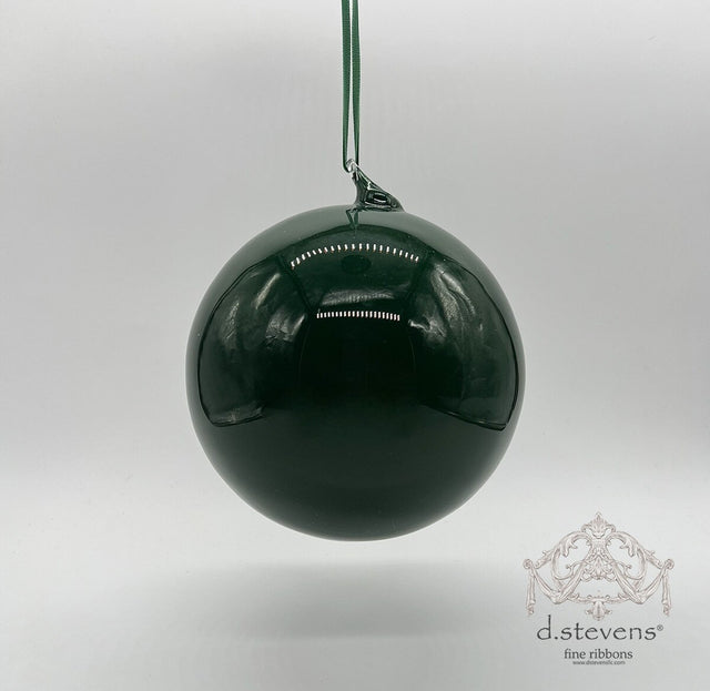 Hunter green glass ball ornament with a polished finish.