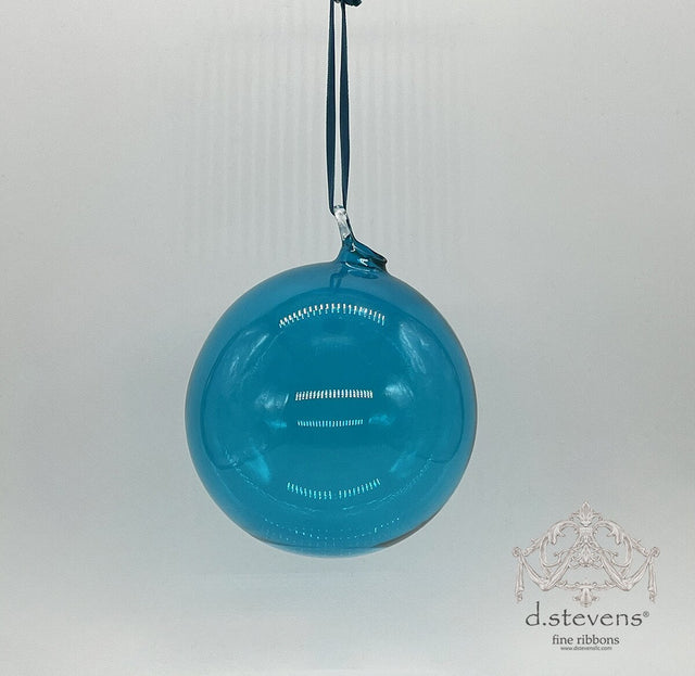 Clear aqua glass ball ornament with a tinted finish.