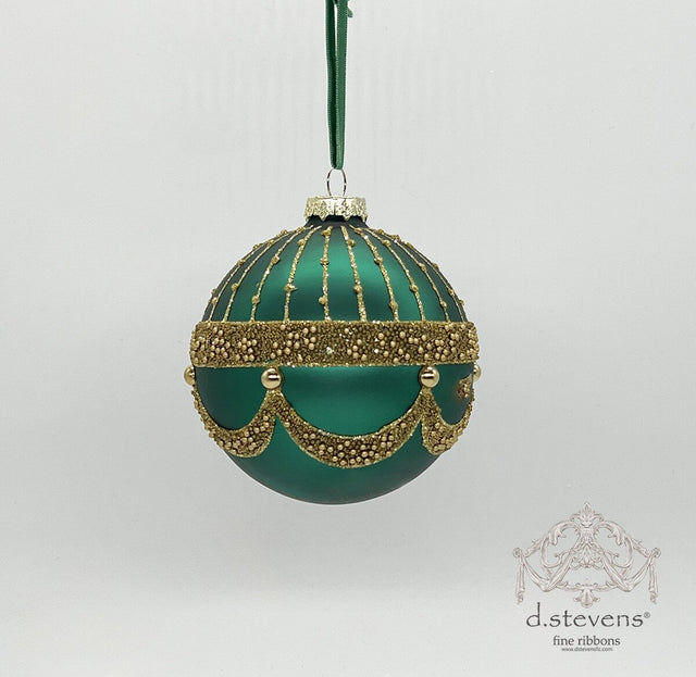Emerald and gold glitter scallop glass ornament.
