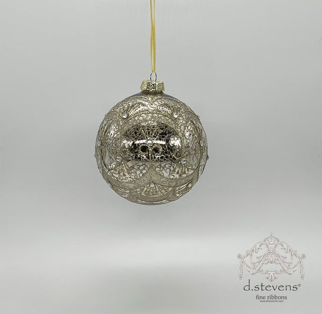 Silver mercury glass ornament with a swirl pattern.