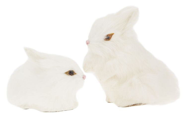White figurine with white bunny detail.