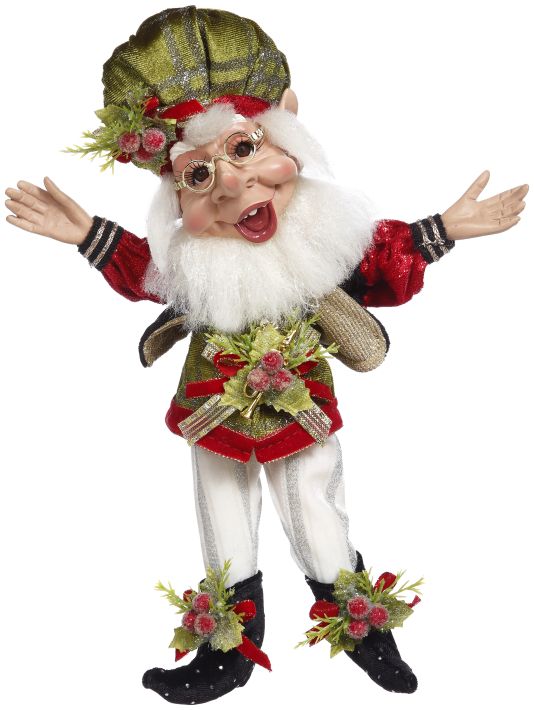 Joyeux Noel elf figurine with festive detail.