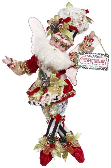 Candymaker fairy figurine with candy detail.