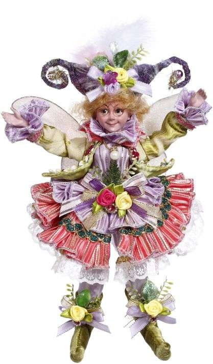 Butterfly fairy girl figurine with winged detail.