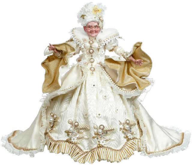 Mrs. Claus figurine with snow white and pearl styling.