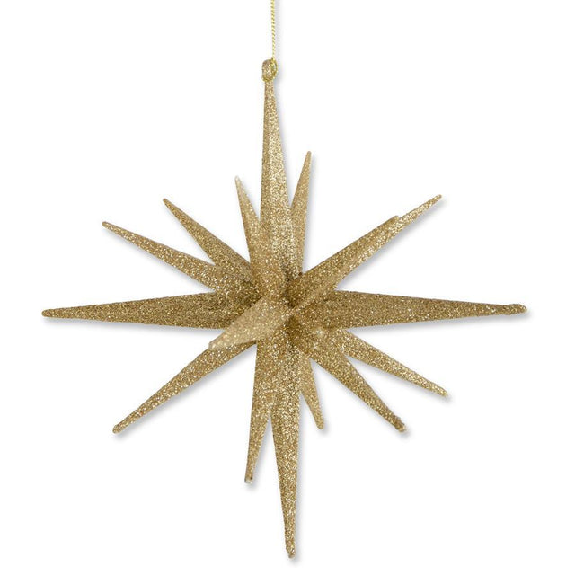 Gold starburst ornament with radiating rays.