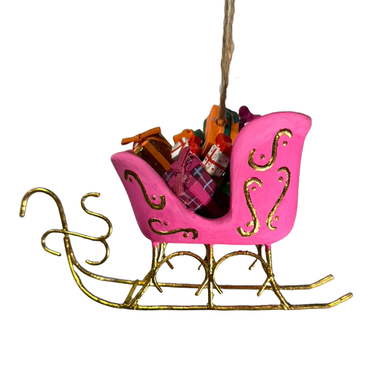 Sleigh ornament piled with presents.