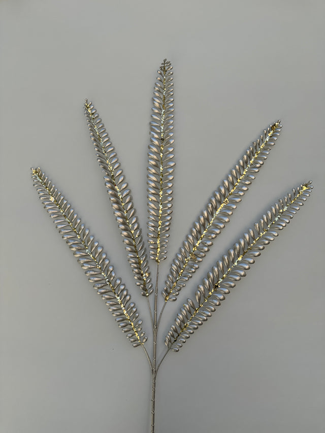 Silver platinum fern spray with fine feathery fronds.