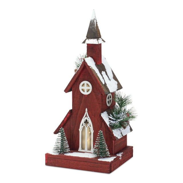 Red church village piece with a traditional finish.