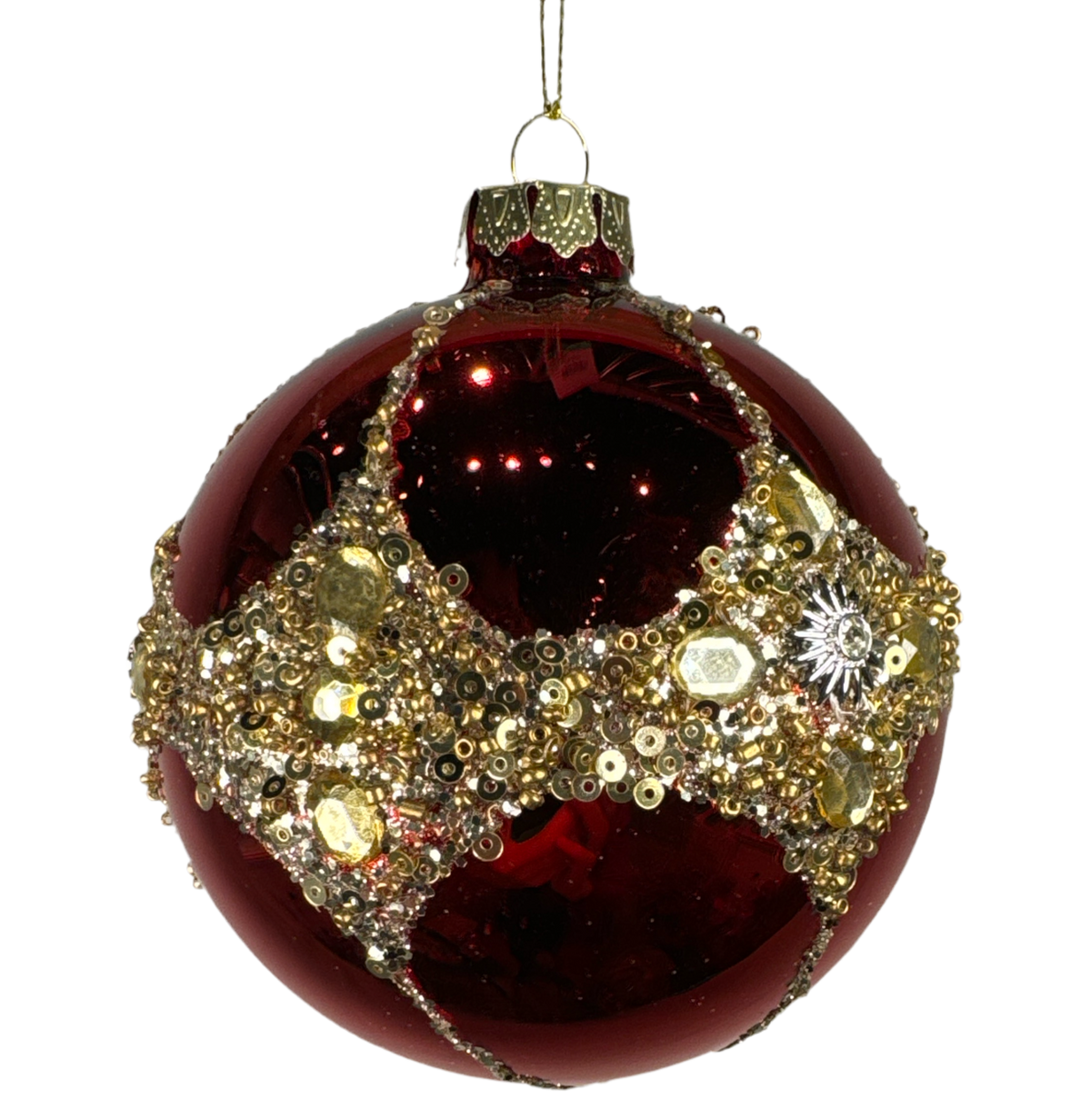 Red glass ball ornament with a jeweled gold band.