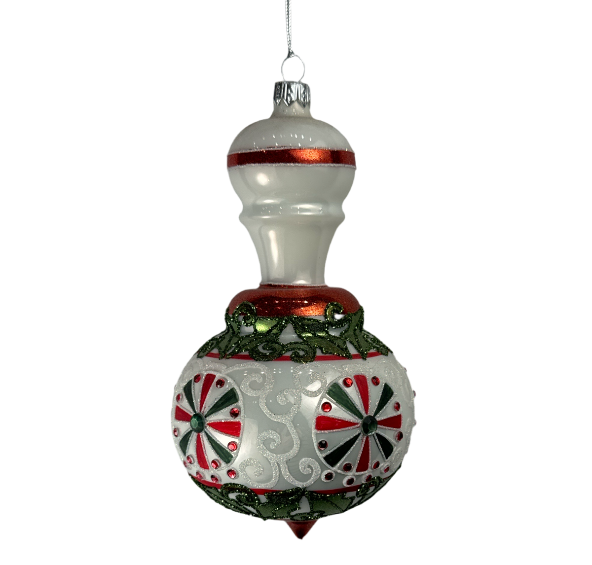 White vintage finial ornament with pinwheel medallions and holly.