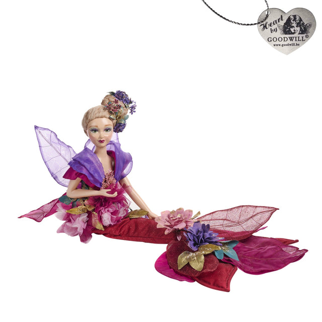 Purple figurine for holiday decorating