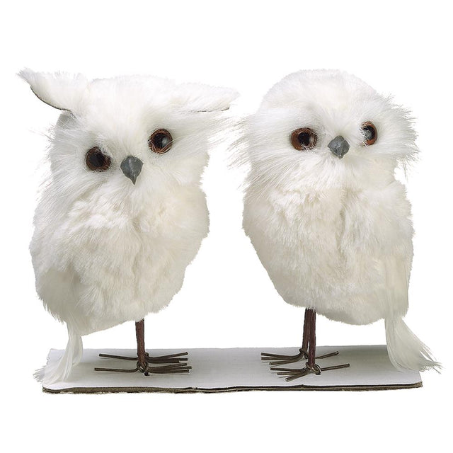 White owl figurines with soft plumage, shown as a set of two.