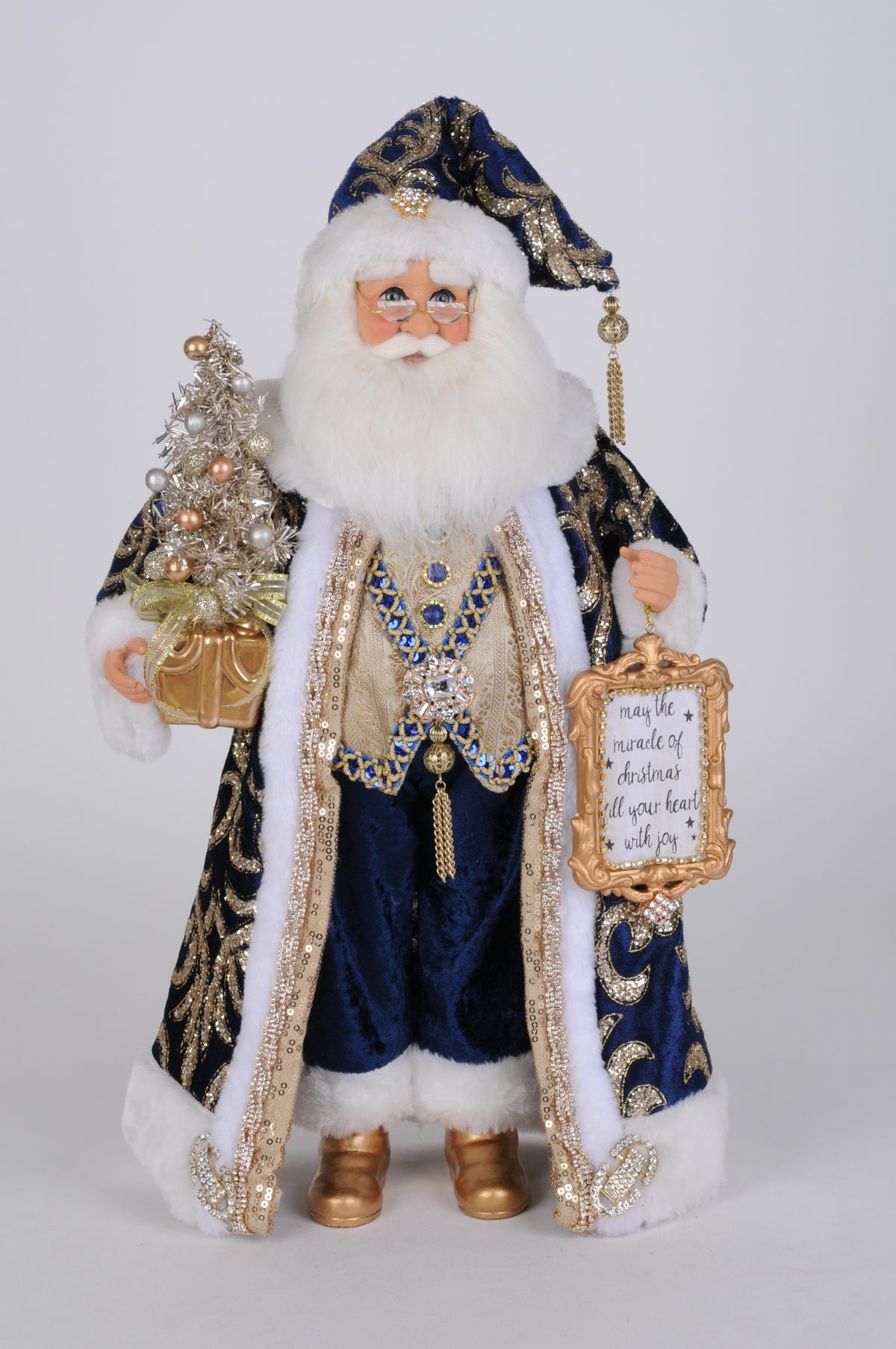Santa figurine in midnight blue with LED light.