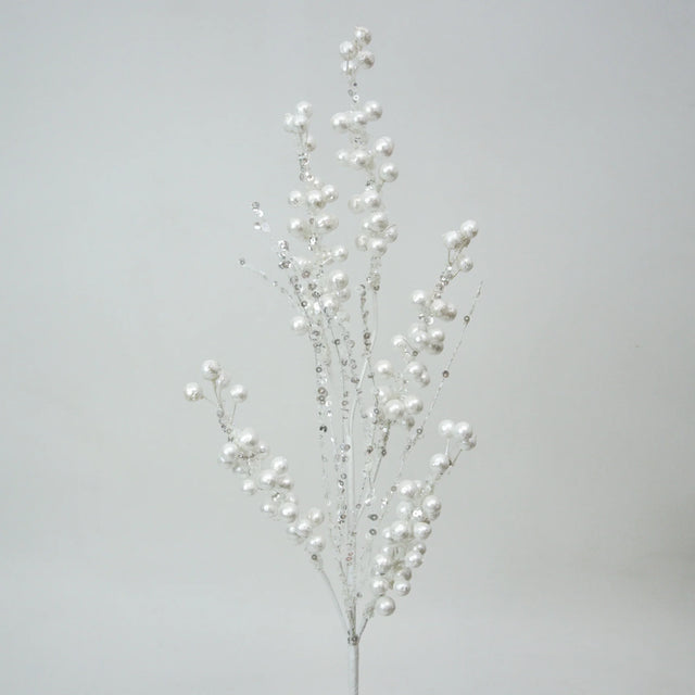 White pearl spray with luminous clusters.