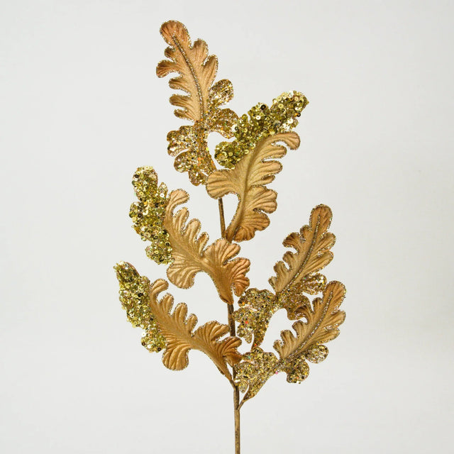 Gold acanthus spray with layered curling leaves.