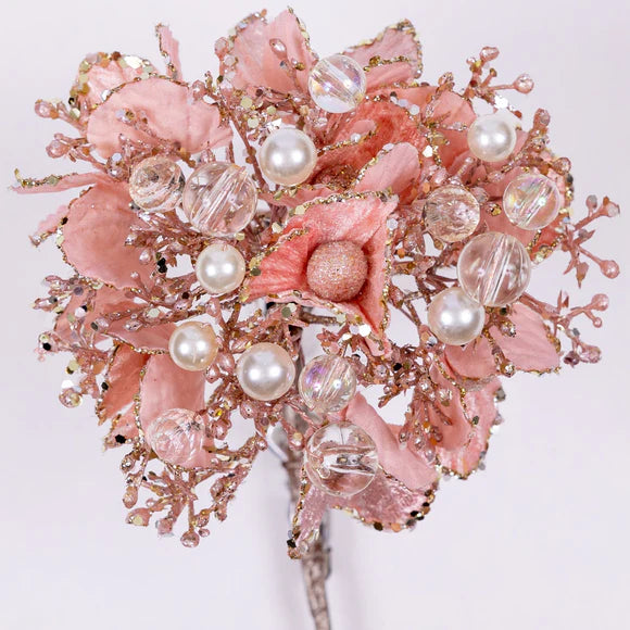 Light pink Victorian hydrangea stem with clustered blooms.