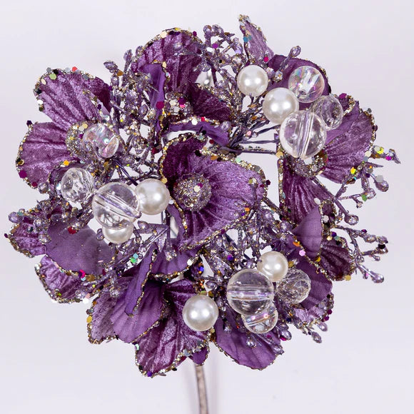 Lavender hydrangea stem with soft clustered blooms.
