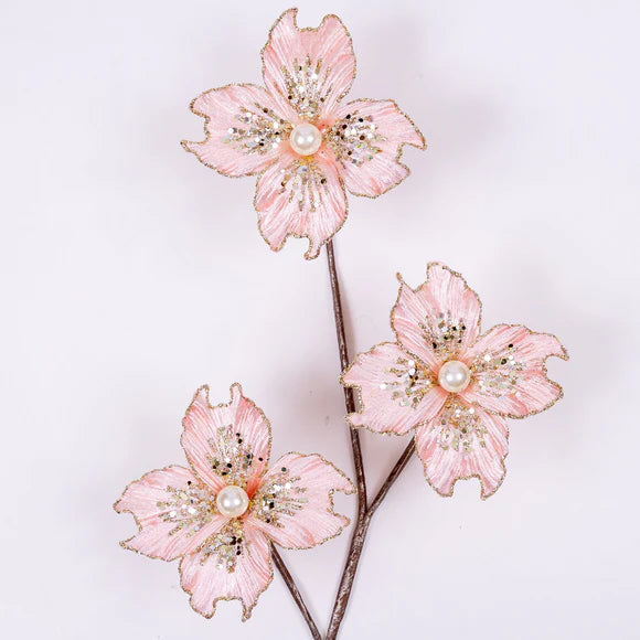 Pink dogwood stem with Victorian blossoms.