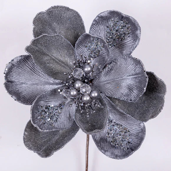 Silver grand magnolia stem with broad sculptural blooms.