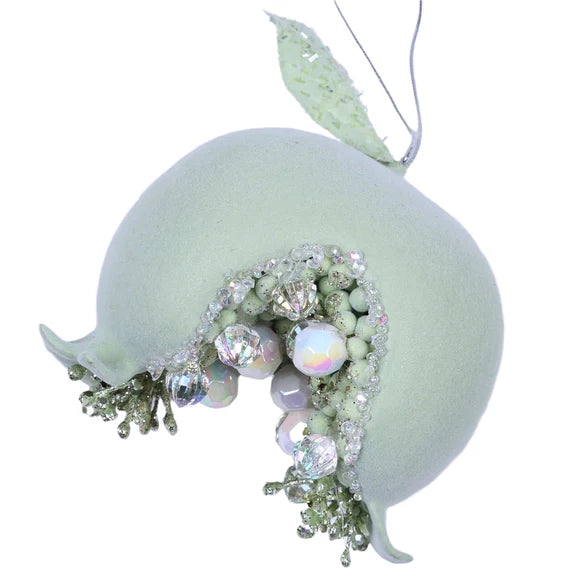 Mint magical pomegranate ornament with a jeweled finish.