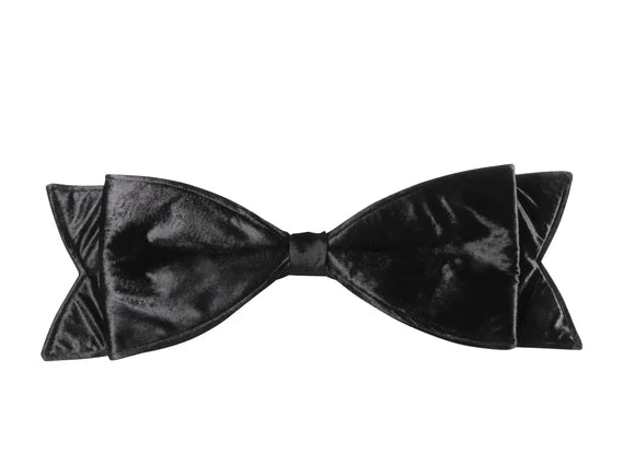 Black velvet bow with a large dramatic form.