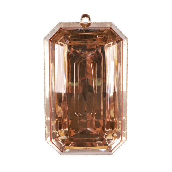 Rose gold gem ornament with a faceted jewel finish.