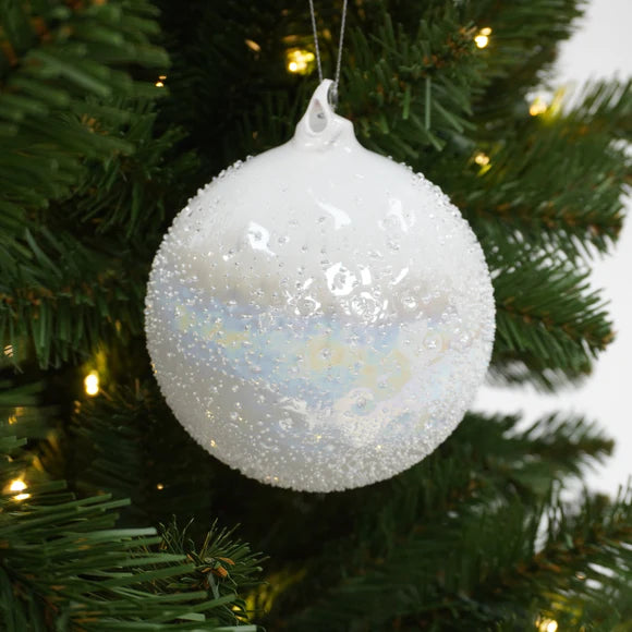 White winter rainbow ball ornament with an iridescent sheen.