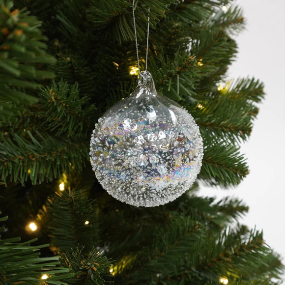 Clear glass ball ornament filled with glistening glitter.