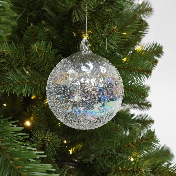 Clear iridescent glistening glass ball ornament.