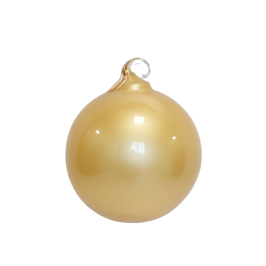 Gold gilded glass ornament with a burnished finish.