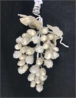 Pearl grape cluster pick with an icy finish.