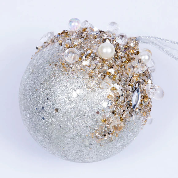 Silver beaded ball ornament covered in jeweled detail.