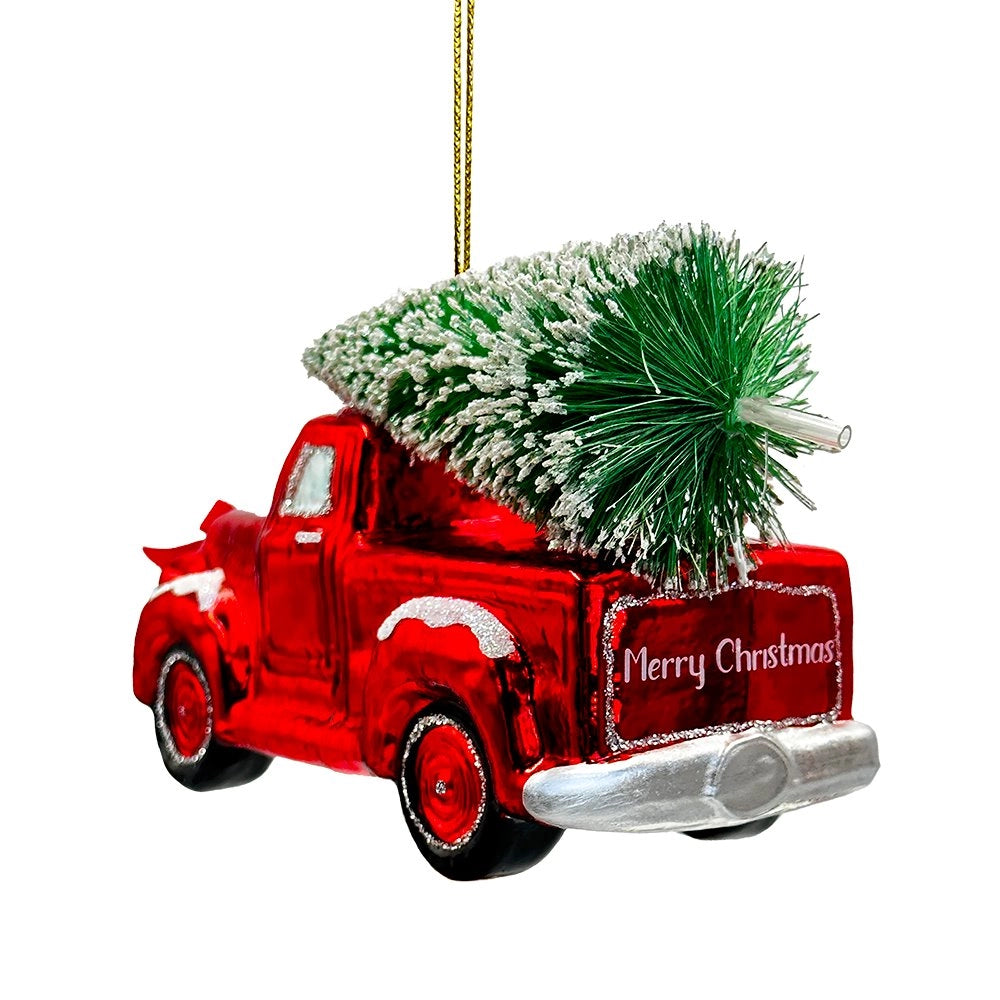 Red glass pickup truck ornament, rear view showing the frosted tree and Merry Christmas tailgate.